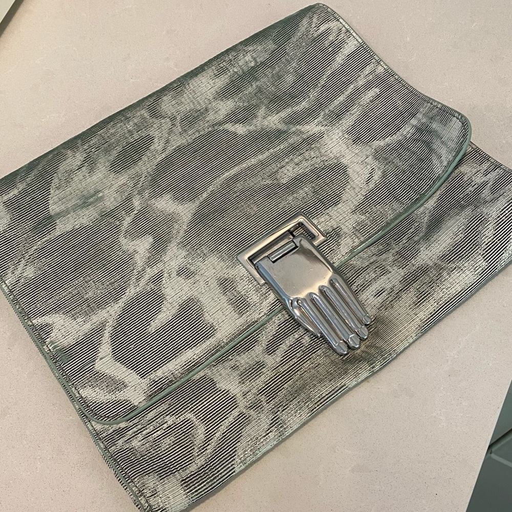 Opening Ceremony large clutch in gray tones with silver hand clasp barely used